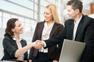 People Shaking Hands After Dealing with Bad Credit Repair in Brooklyn, Farmingdale, Garden City, Medford, Middle Island, NY